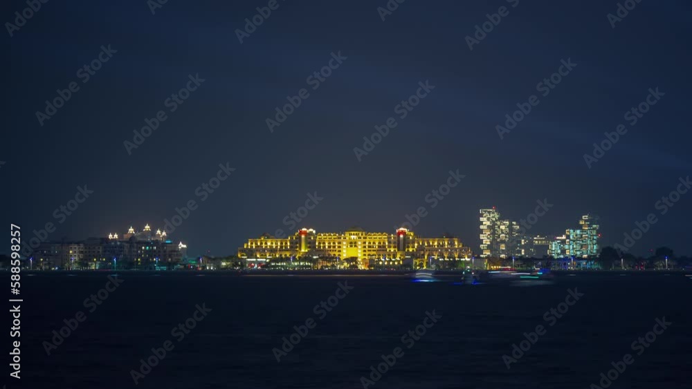 night illumination dubai city famous palm island traffic bay new modern luxury hotel exterior panorama 4k timelapse uae night illumination dubai city famous palm island traffic bay new modern luxury hotel exterior panorama 4k timelapse uae