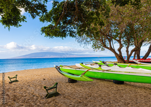 Outrigger  Racing Conoes on The Beach With Lania on The Horizon, Hanakao'o Park, Lahaina, Maui, Hawaii, USA photo