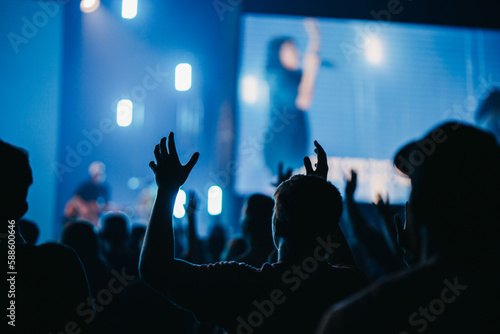 crowd of people worshiping