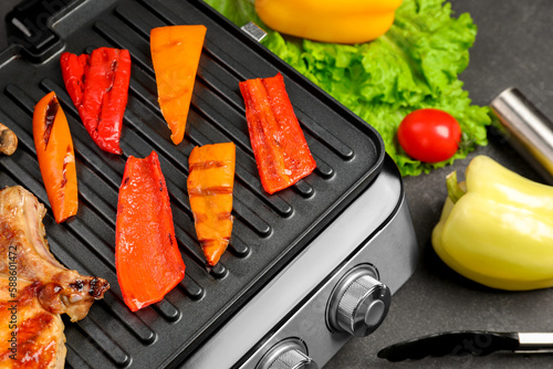 Electric grill cooking red ...