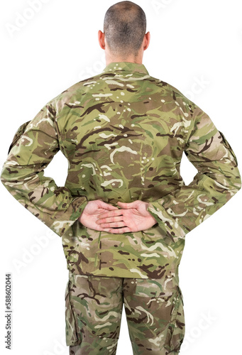 Rear view of soldier standing with his hands behind back