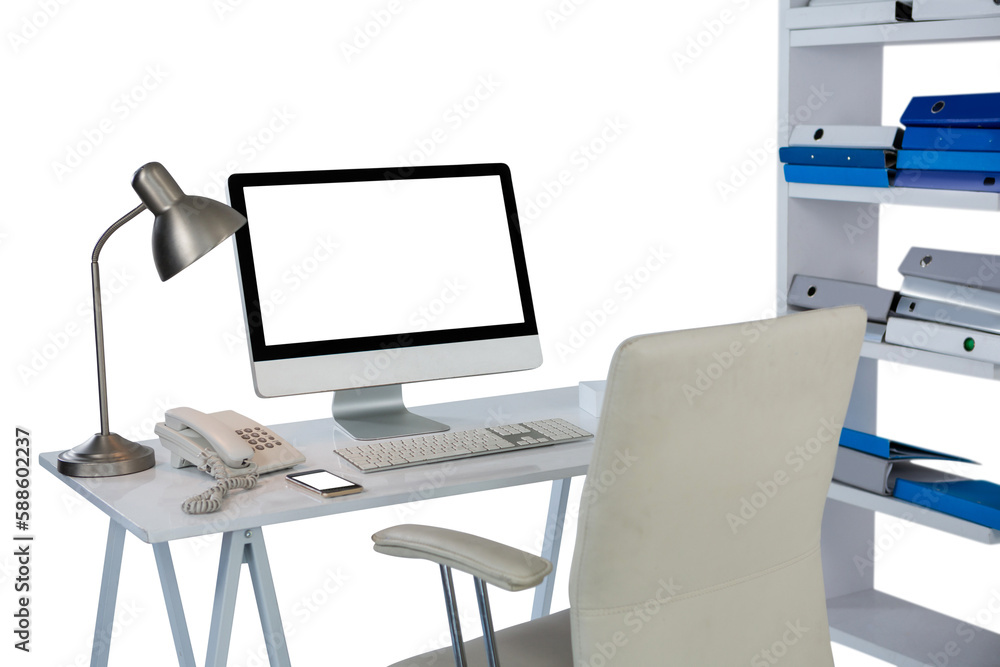 Computer with telephone and mobile phone at desk Computer with telephone and mobile phone at desk