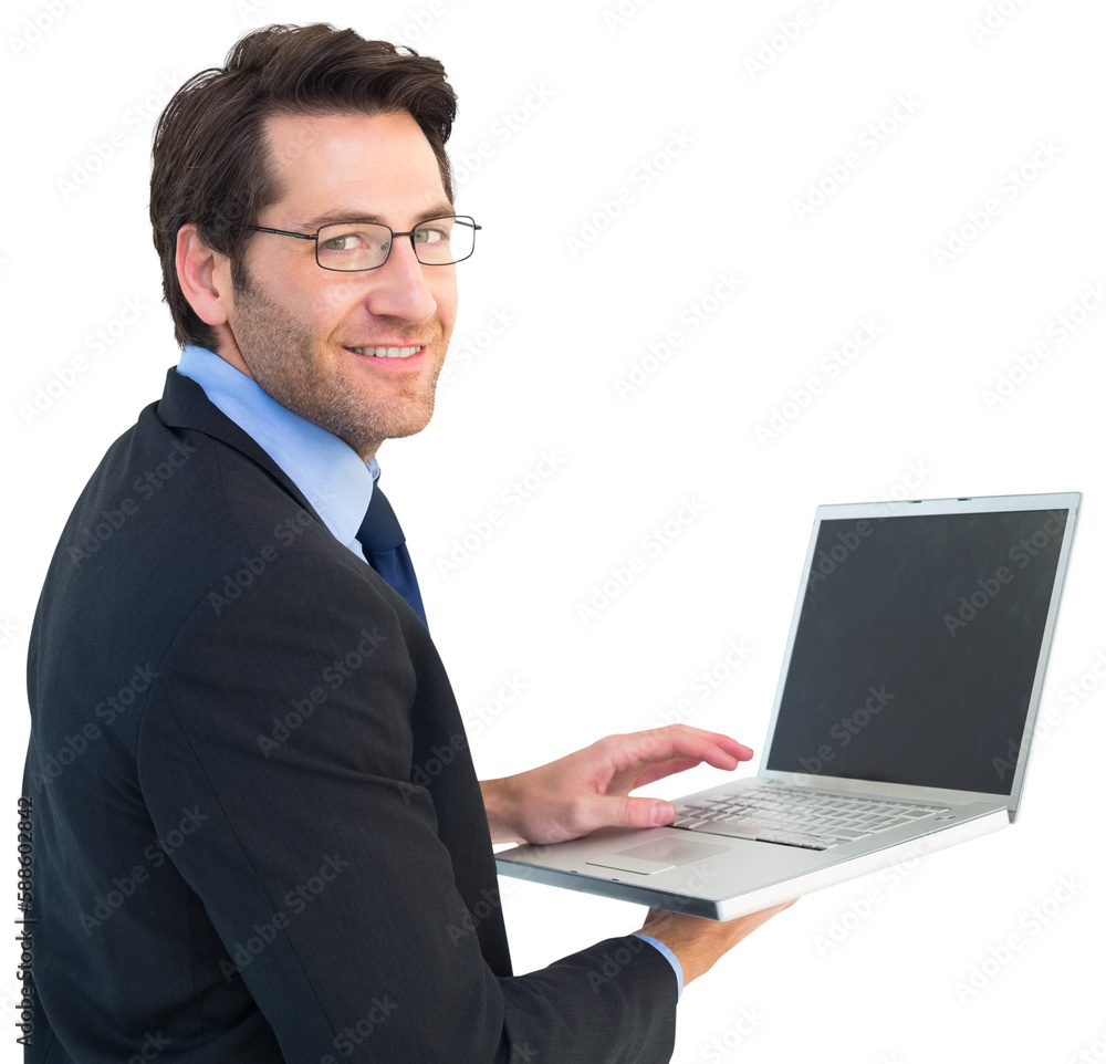Smiling businessman using a laptop Smiling businessman using a laptop