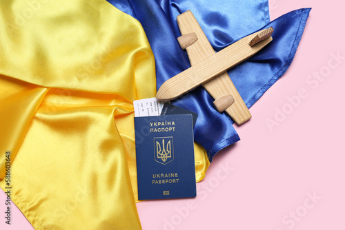 Passport with toy airplane ...