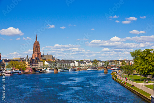 Frankfurt panoramic view across River Main bridge to skyscrapers Germany. photo