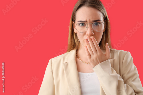 Shocked young businesswoman...