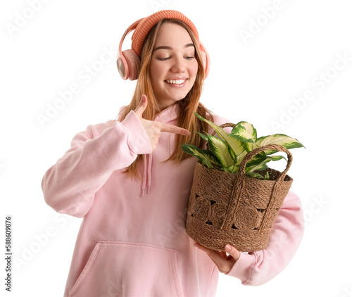 Young woman in headphones p...