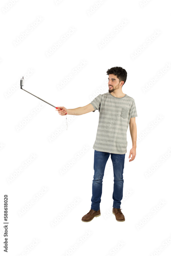 Casual man using a selfie stick Casual man using a selfie stick