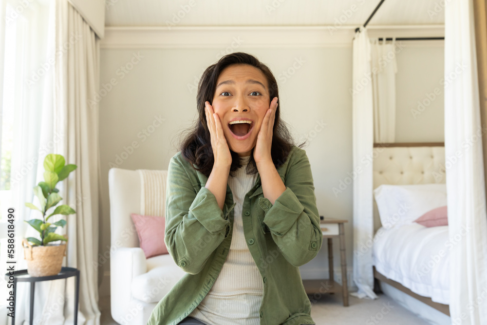 Happy asian woman using having video call in bedroom Happy asian woman using having video call in bedroom