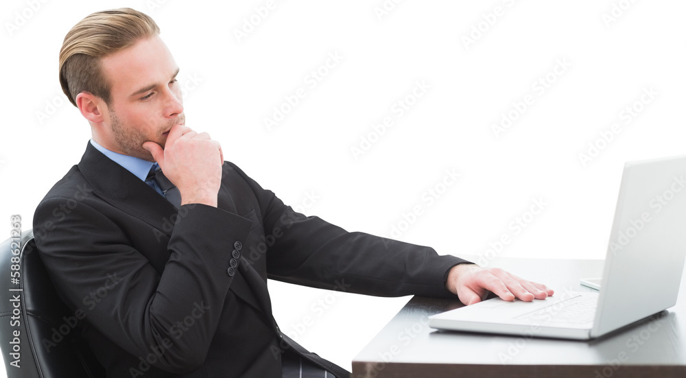 Thoughtful businessman with laptop at desk Thoughtful businessman with laptop at desk