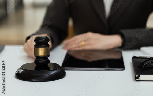 Asian lawyer woman working at law office desk, law firms, advice and justice concept.