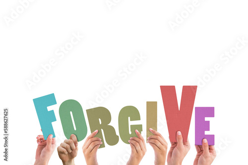 Cropped hands holding colorful word forgive  photo