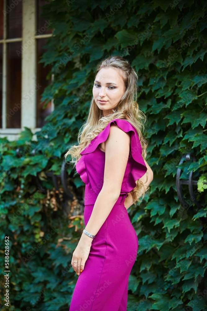 A beautiful young girl in bright clothes. A beautiful young girl in bright clothes.