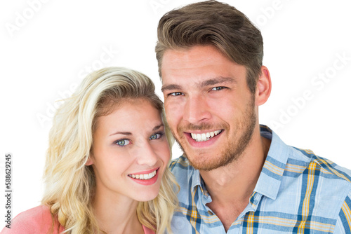 Attractive young couple smiling at camera © vectorfusionart