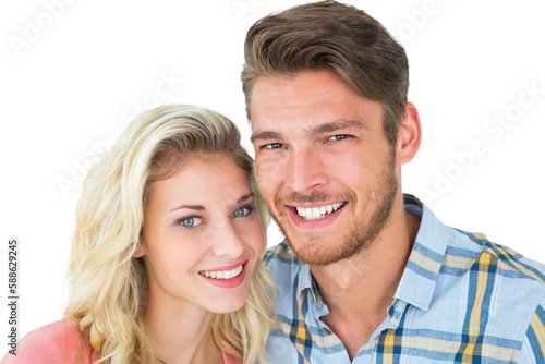 Attractive young couple smiling at camera