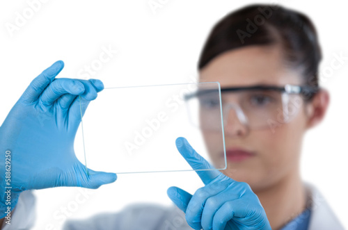 Fototapeta Naklejka Na Ścianę i Meble -  Female scientist touching glass slab