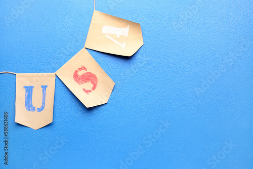 USA flags on blue backgroun...