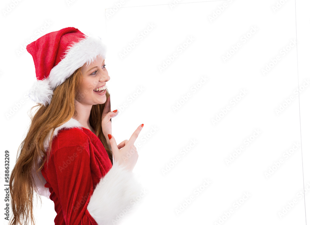Festive redhead smiling at camera holding poster Festive redhead smiling at camera holding poster