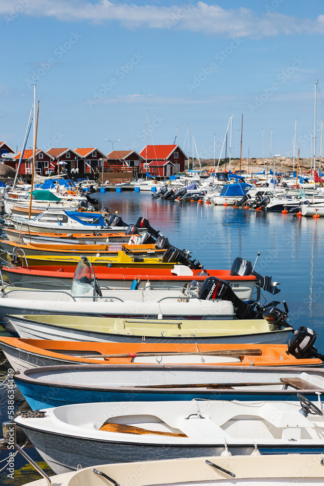 Marina with moored boats at the coast