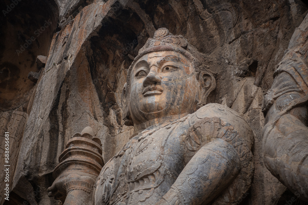 The Longmen Grottoes or Longmen Caves are one of the finest examples of Chinese Buddhist art. Portrait in the rock, Unesco World Heritage site The Longmen Grottoes or Longmen Caves are one of the finest examples of Chinese Buddhist art. Portrait in the rock, Unesco World Heritage site