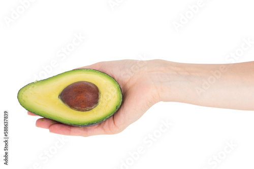 Woman presenting half of an avocado 