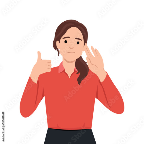 Young woman uses hearing aid and shows thumbs up confirming good sound volume thanks to new device. Gray-haired old lady with hearing aid enjoys opportunity to hear others and communicate freely