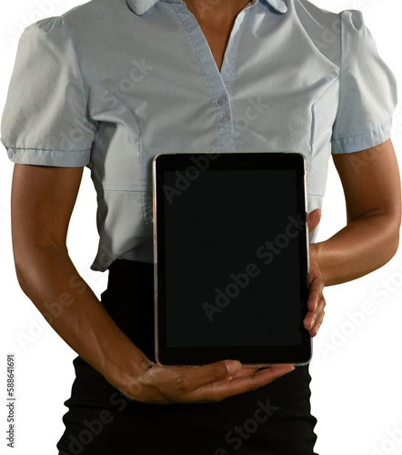 Mid section of woman holding digital tablet