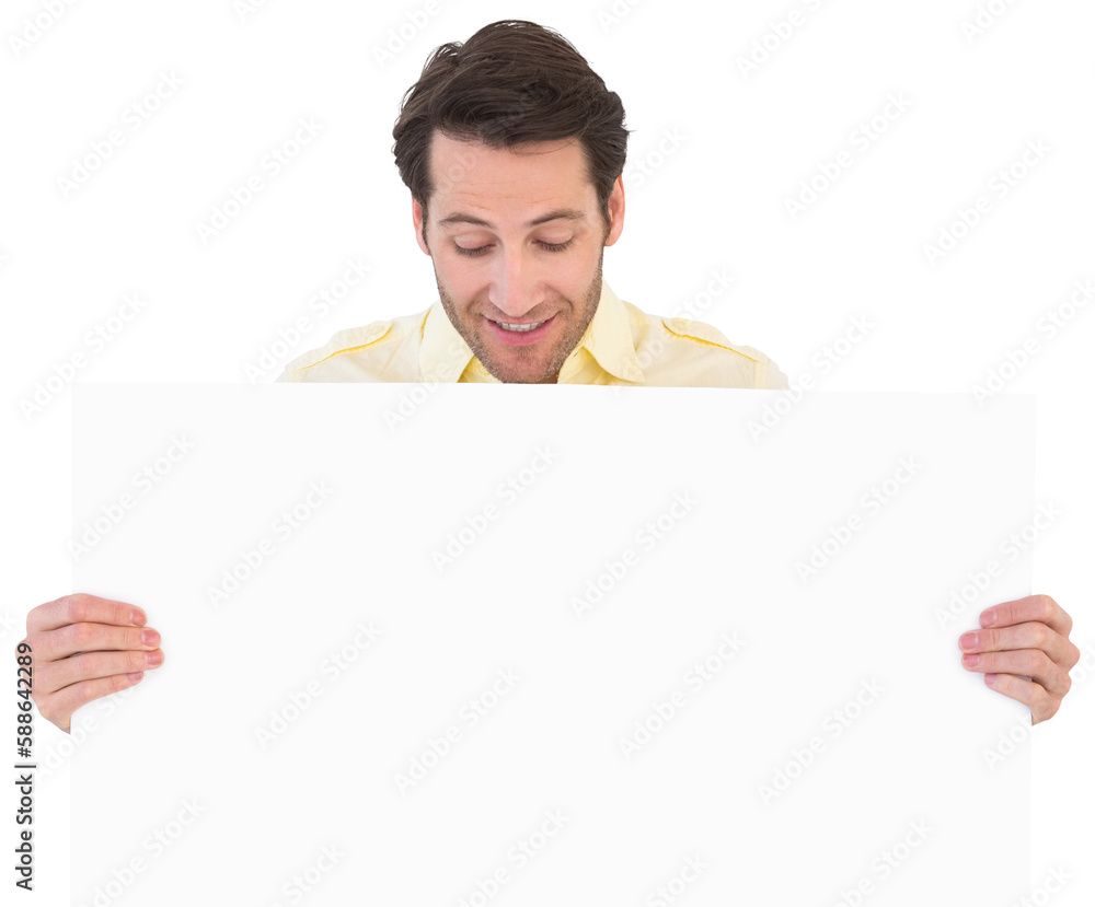 Attractive man smiling and holding poster Attractive man smiling and holding poster