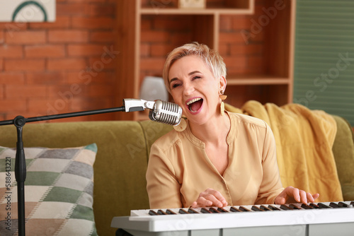 Mature female musician play...