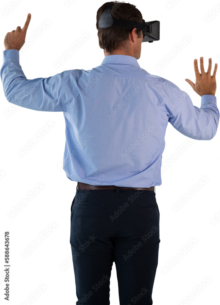 Rear view of businessman wearing VR glasses pointing Rear view of businessman wearing VR glasses pointing