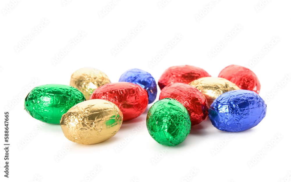 Chocolate Easter eggs in colorful foil isolated on white background Chocolate Easter eggs in colorful foil isolated on white background
