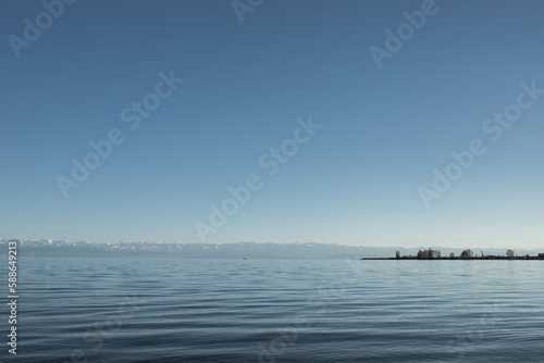Tranquil Lake View at Dusk in Soft Blue Hues © Sen.Sever