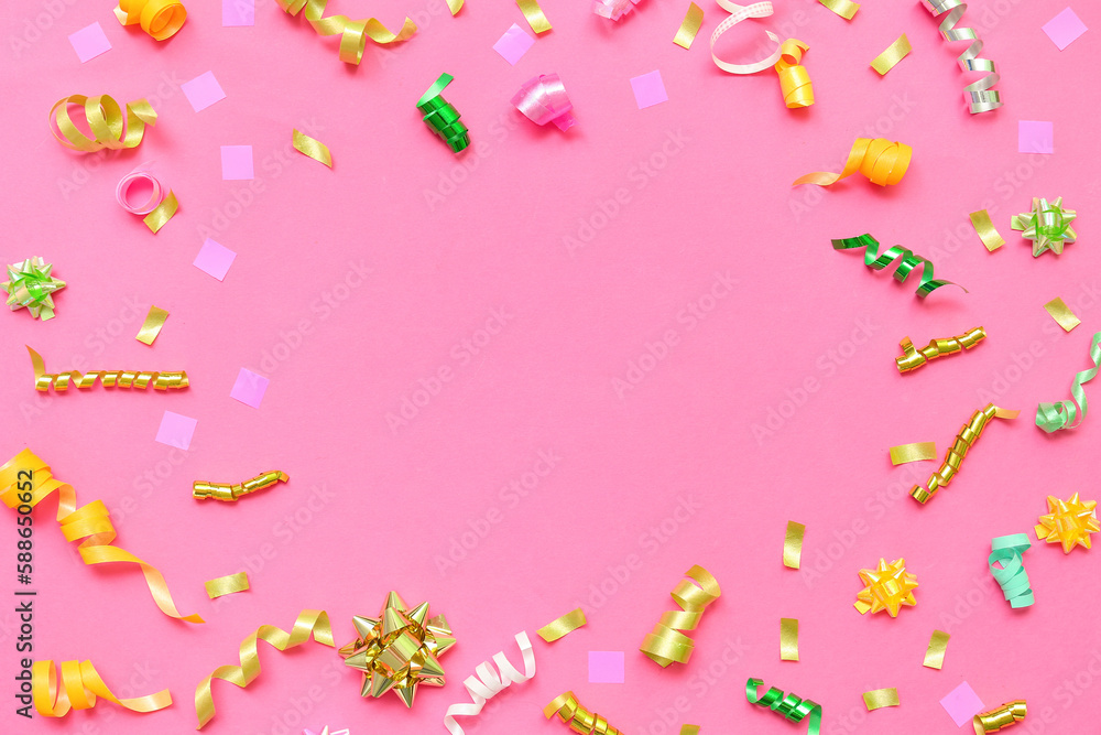 Frame made of confetti on pink background Frame made of confetti on pink background