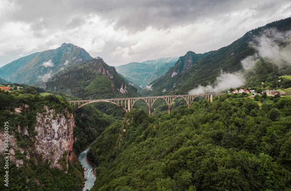 Tara bridge in Montenegro with dramatic skies