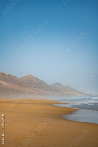 Stunning view of Cofete beach surrounded by the chain of mountains of the Jandía Natural Park. Fuerteventura, Canary Islands.