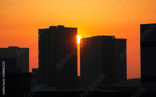 Sunrise in Tokyo. Beautiful cityscape with the modern skyscraper office buildings on skyline of Tokyo during sunrise. Travel to Japan.