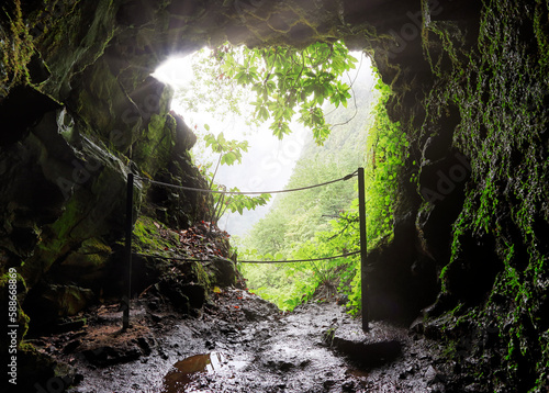 Tunnel in Madeira on walk hiking trail, Levada Caldeirao Verde photo