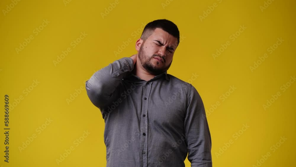 4k video of one man with negative facial expression on yellow background. 4k video of one man with negative facial expression on yellow background.