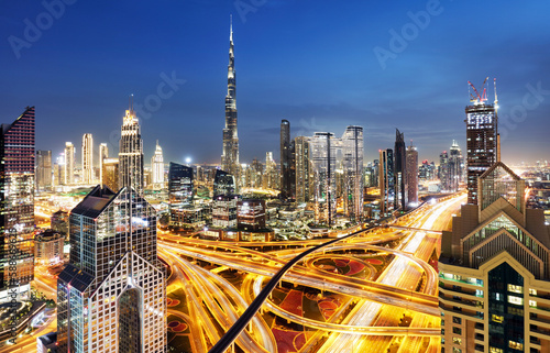 Panorama of skyline downtown Dubai - Aerial view at night  United Arab Emirates