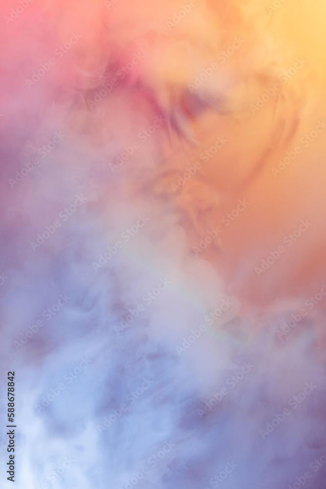 Colorful abstract image of multicolored smoke spreading in neon colors. Design for gadgets wallpaper, background, advertising and design. Pastel colors. Creative vision. Smoke texture