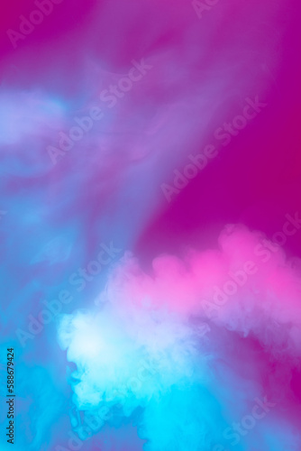 Blue and pink. Abstract multicolored smoke spreading in neon light. Design for advertisement  gadgets wallpapers and backgrounds. Smoke texture. Creative colors combination