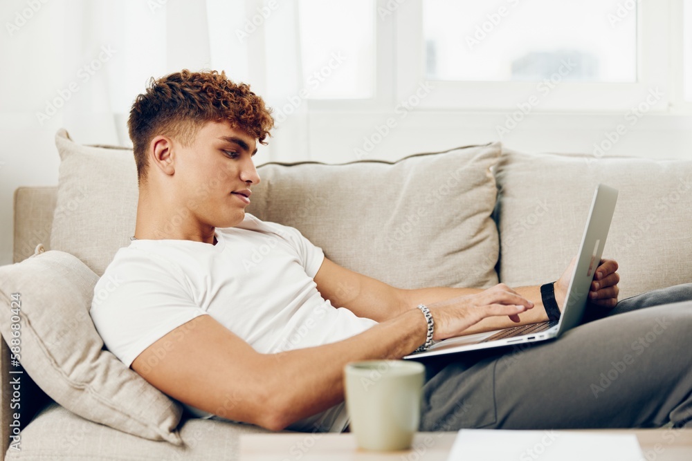 man interior notebook wireless laptop home lifestyle curly blissful computer modern cyberspace man interior notebook wireless laptop home lifestyle curly blissful computer modern cyberspace