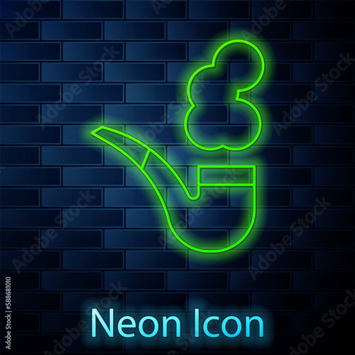 Glowing neon line Smoking pipe with smoke icon isolated on brick wall background. Tobacco pipe. Vector
