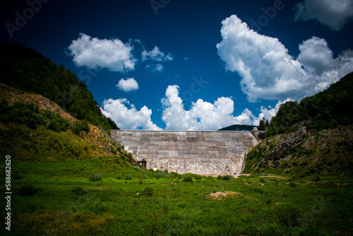 Romania, Lesu Ursului Dam is located in Bihor County. The lake was emptied due to the cracks in the wall risked being destroyed by water. Since then, the dam is empty because of no funds for repairs. photo