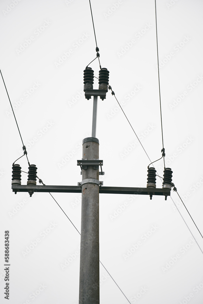 Obraz premium Isolated power pole and power lines