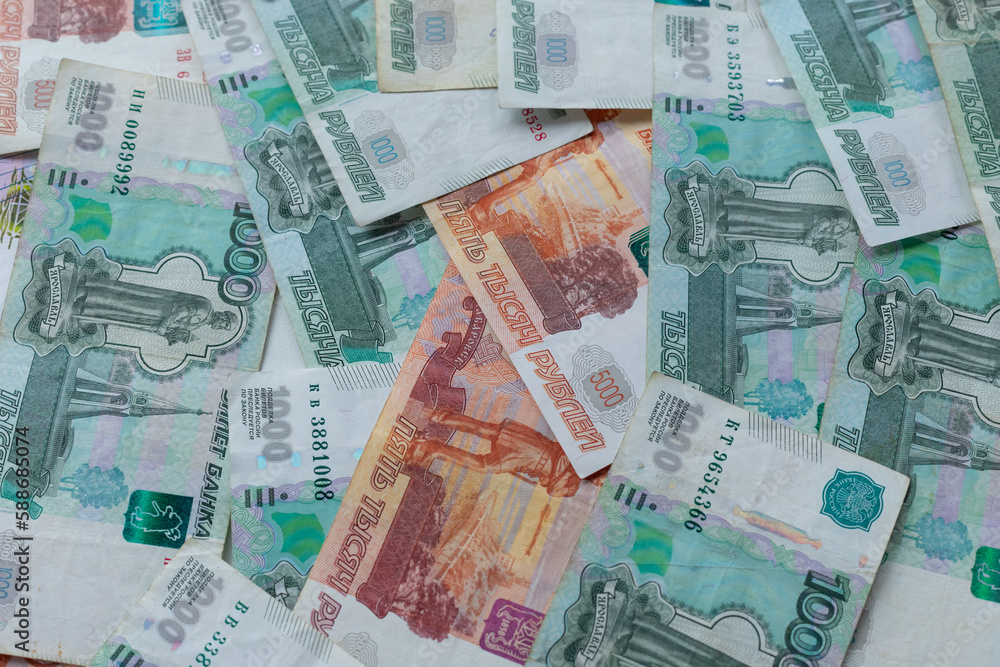 Russian money. Different denomination of bills. Close-up of Russian rubles. Finance concept. Money background and texture. Copy space. - obrazy, fototapety, plakaty 