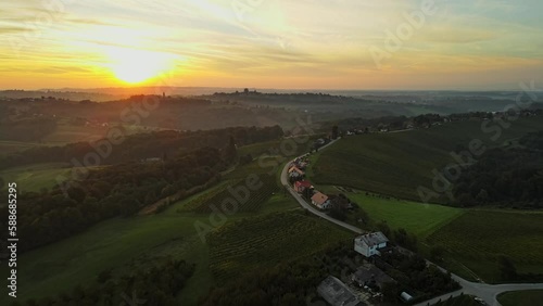 Aerial 4K drone footage of Kog during sunrise. It is a village in the hills northeast of Ormož in northeastern Slovenia, right on the border with Croatia. photo