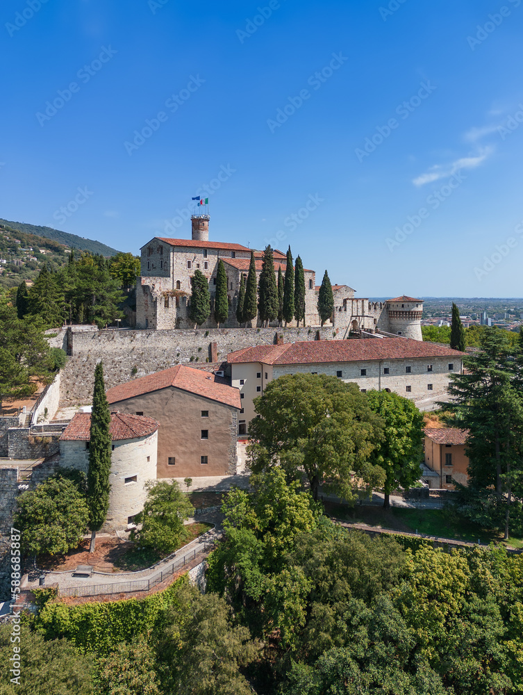 Vertical panoramic view of the western part of the historical castle in the city of Brescia. Lombardy, Italy