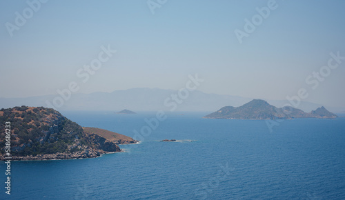 Bodrum summer travel to Turkey. Summer noon sea village Gumusluk Mugla province, bay with clear blue water