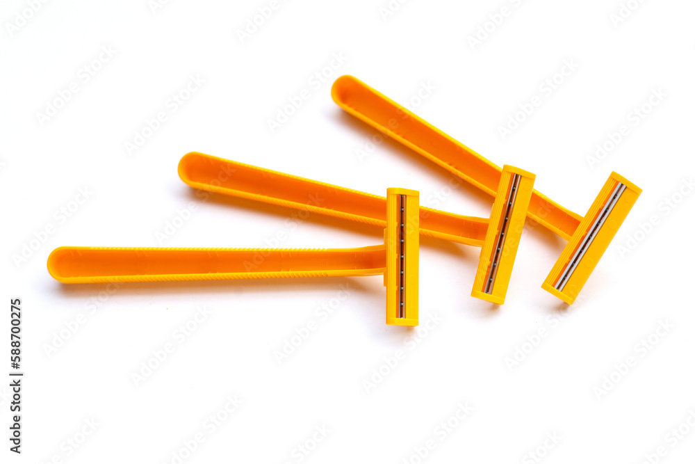 Orange shaving razor isolated on white background Orange shaving razor isolated on white background